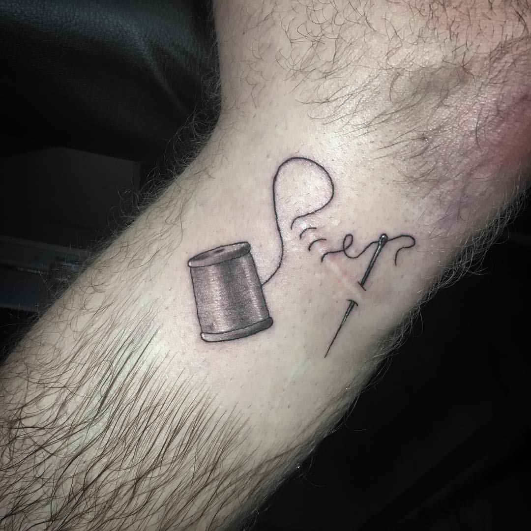 The best way to take care of a cut is to sew it up, which is what this person was trying to get at with this apt tattoo.